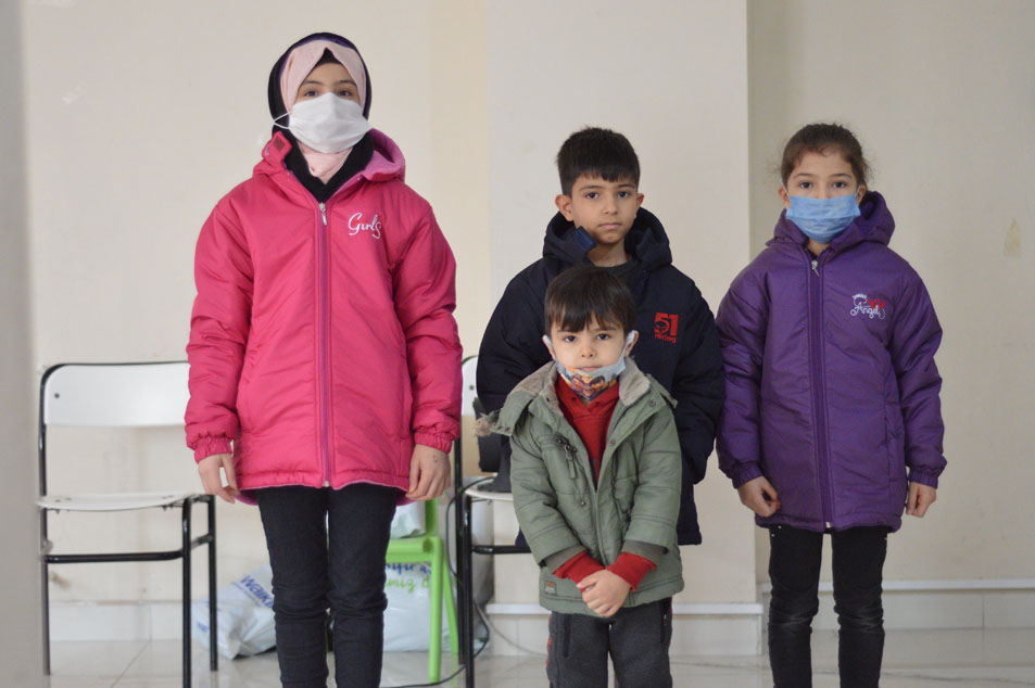 providing the kids in winter time with jackets and some clothes.