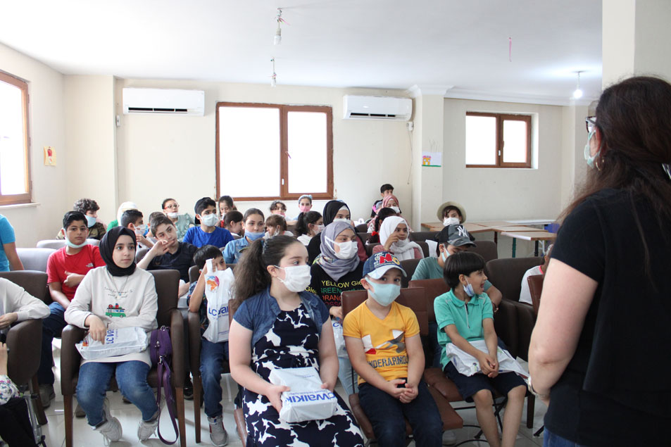 Providing students with clothes by Mrs Mirna Barq.