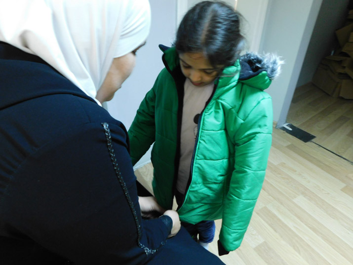 Hanan Team and Volunteers Provided The Kids with Jackets and Shoes