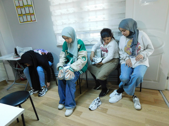 Hanan Team and Volunteers Provided The Kids with Jackets and Shoes